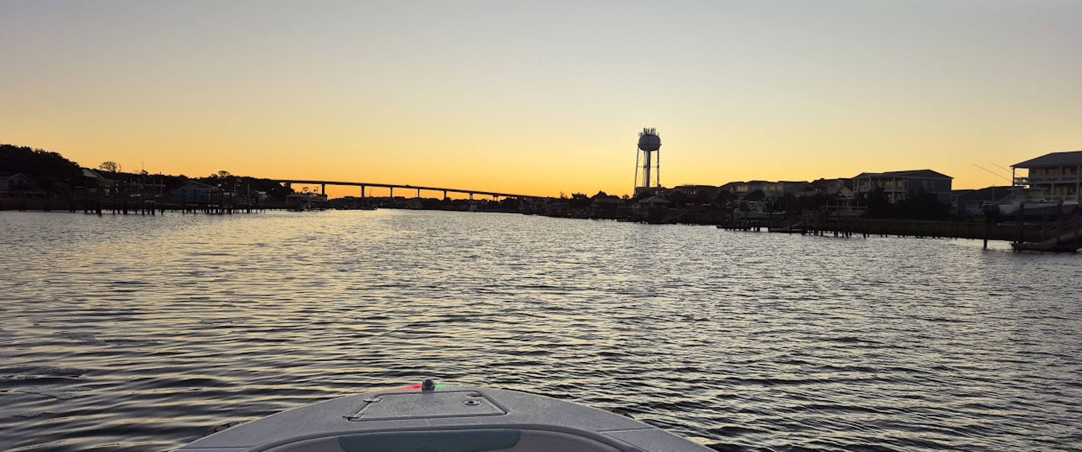 Sunset with bridge and water tower